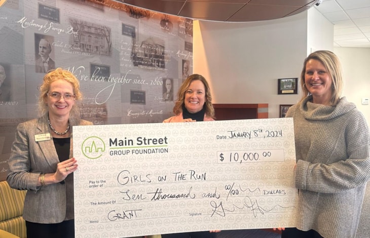 Photo of GOTR Wocester County staff receiving check from Main Street Bank for $10,000.